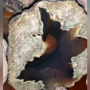 Thunder Egg (trapped (result of trapped volcanic gases, sediment, and preserve)